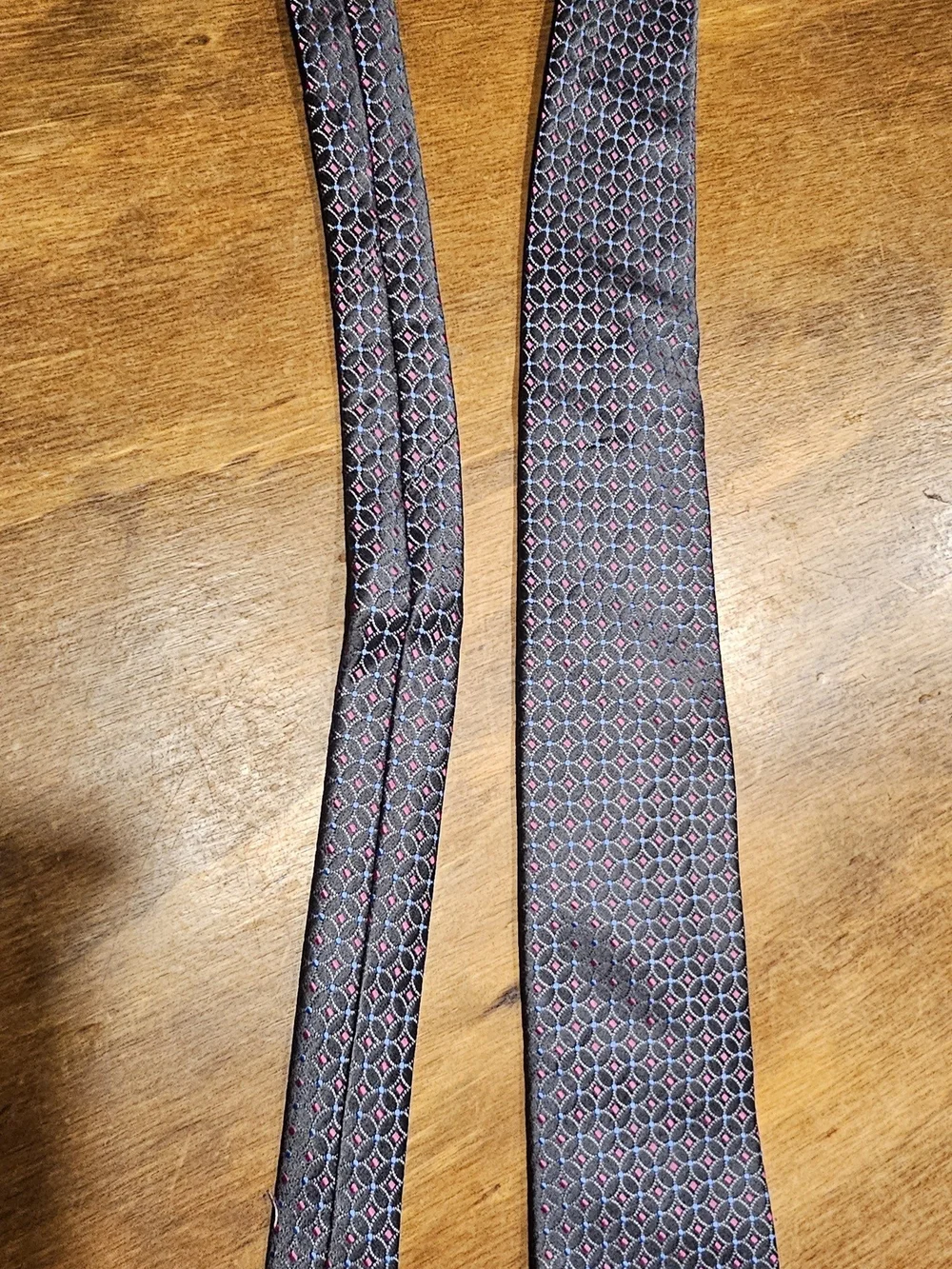 C3, The Croft & Barrow Purple Tie is a stylish accessory for men.